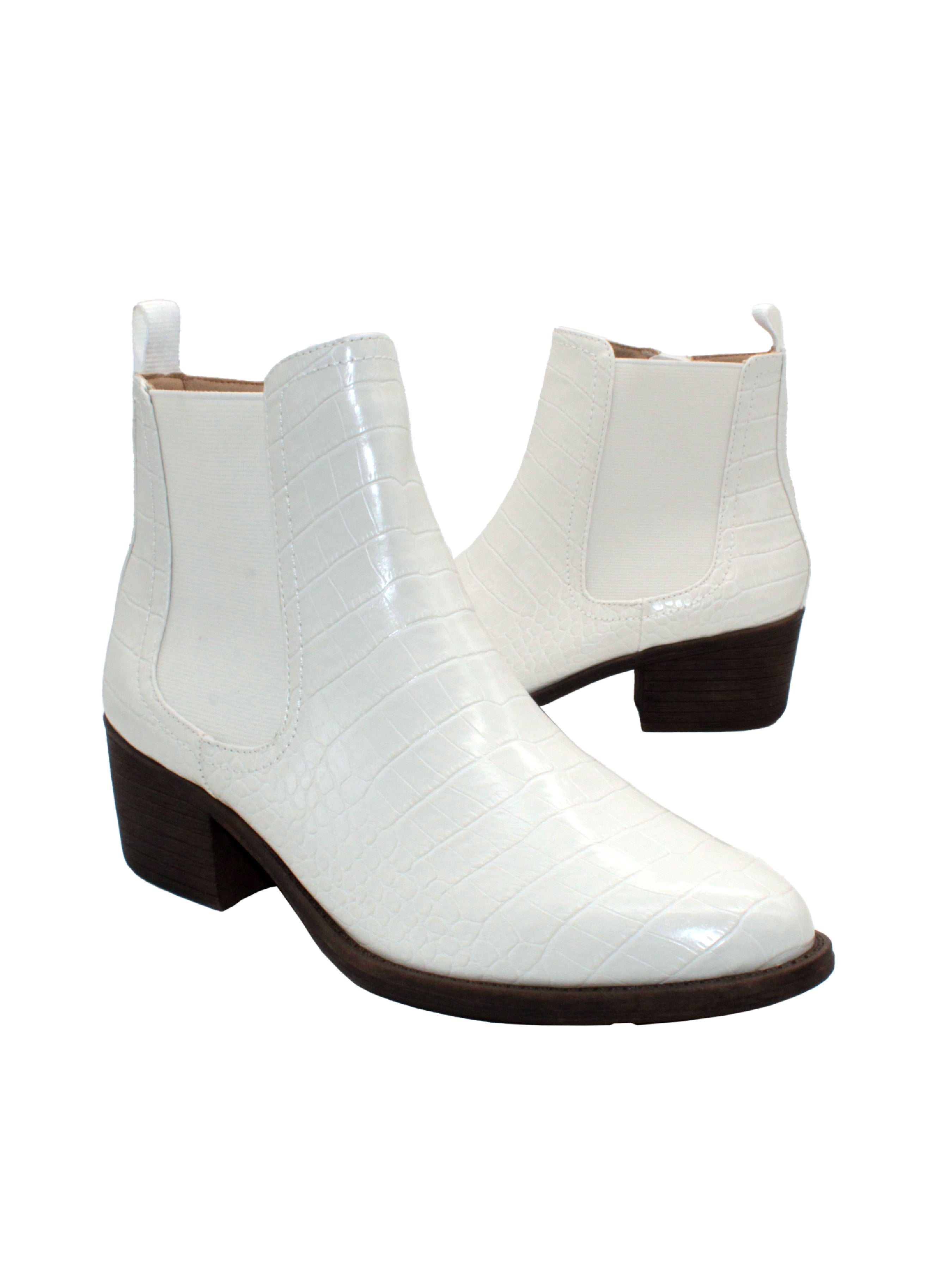 The ‘Carriage’ Chelsea bootie by Volatile, in beautiful rustic effect faux leather or matte metallic faux snake, is right on trend with a wide elastic side panel allowing for flexibility and comfort while walking. We took the level of ease a step further by adding an inside zipper, making these booties effortless to put on and off. The classic toe shape and heel will go with everything, from printed dresses to jeans.