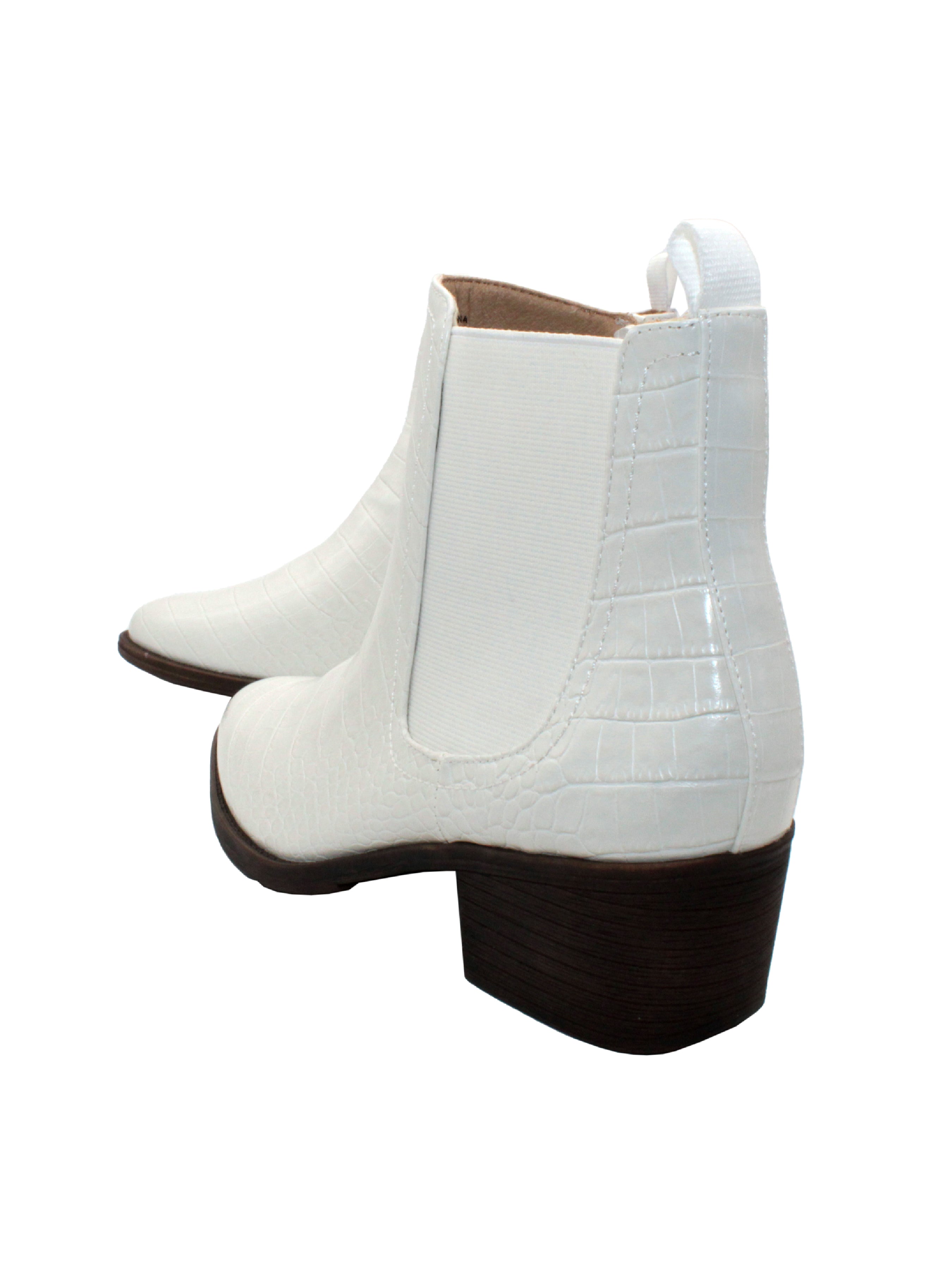 The ‘Carriage’ Chelsea bootie by Volatile, in beautiful rustic effect faux leather or matte metallic faux snake, is right on trend with a wide elastic side panel allowing for flexibility and comfort while walking. We took the level of ease a step further by adding an inside zipper, making these booties effortless to put on and off. The classic toe shape and heel will go with everything, from printed dresses to jeans.