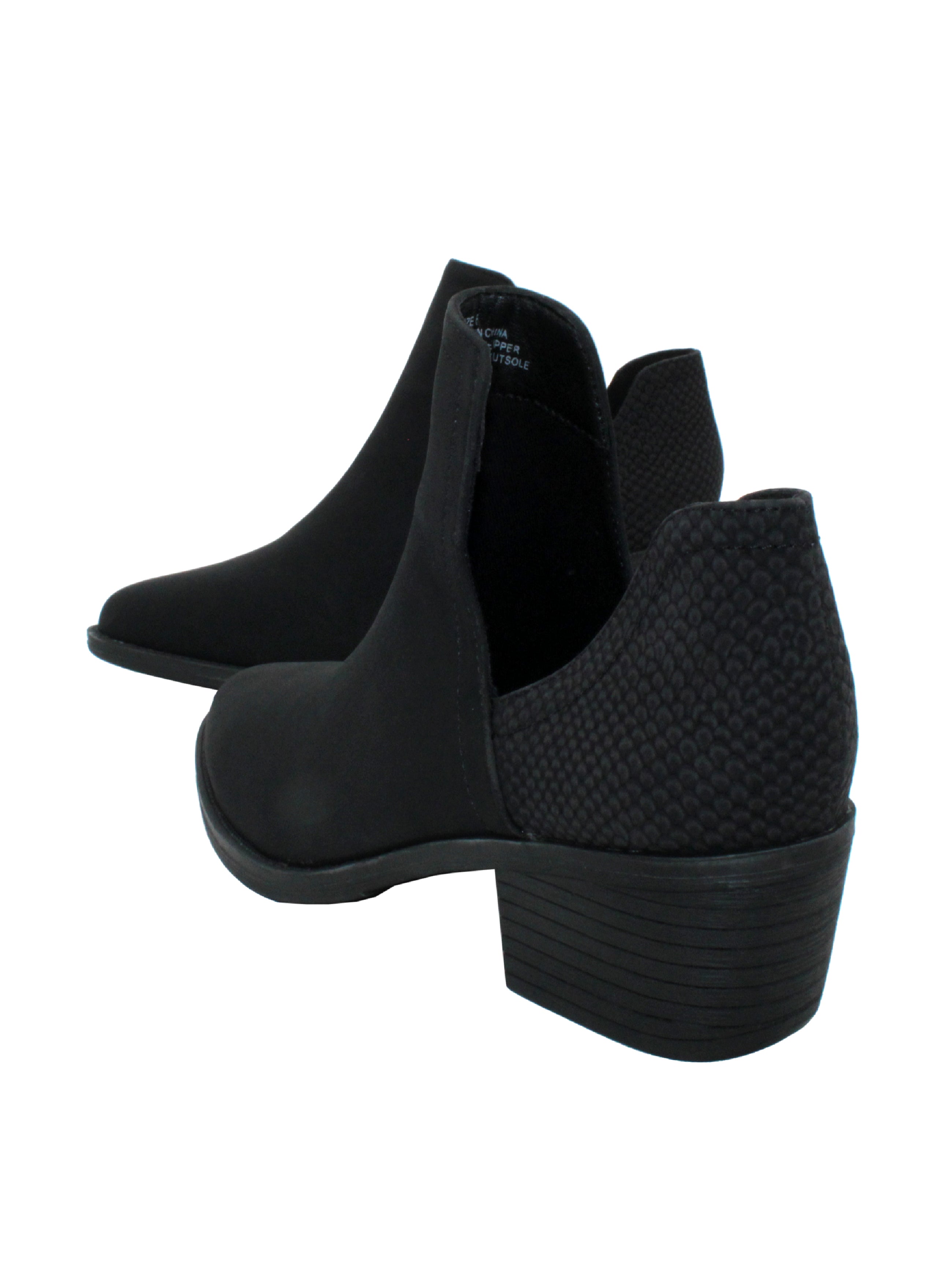 Our fan favorite CHRONICLE bootie by Volatile has been crafted in exotic materials, embossed faux croco or multicolored faux snake, for the new fall season. The upper features an attractive open shank that complement dresses and jeans alike. The padded insole is stationed atop a flexible and sturdy rubber outsole.