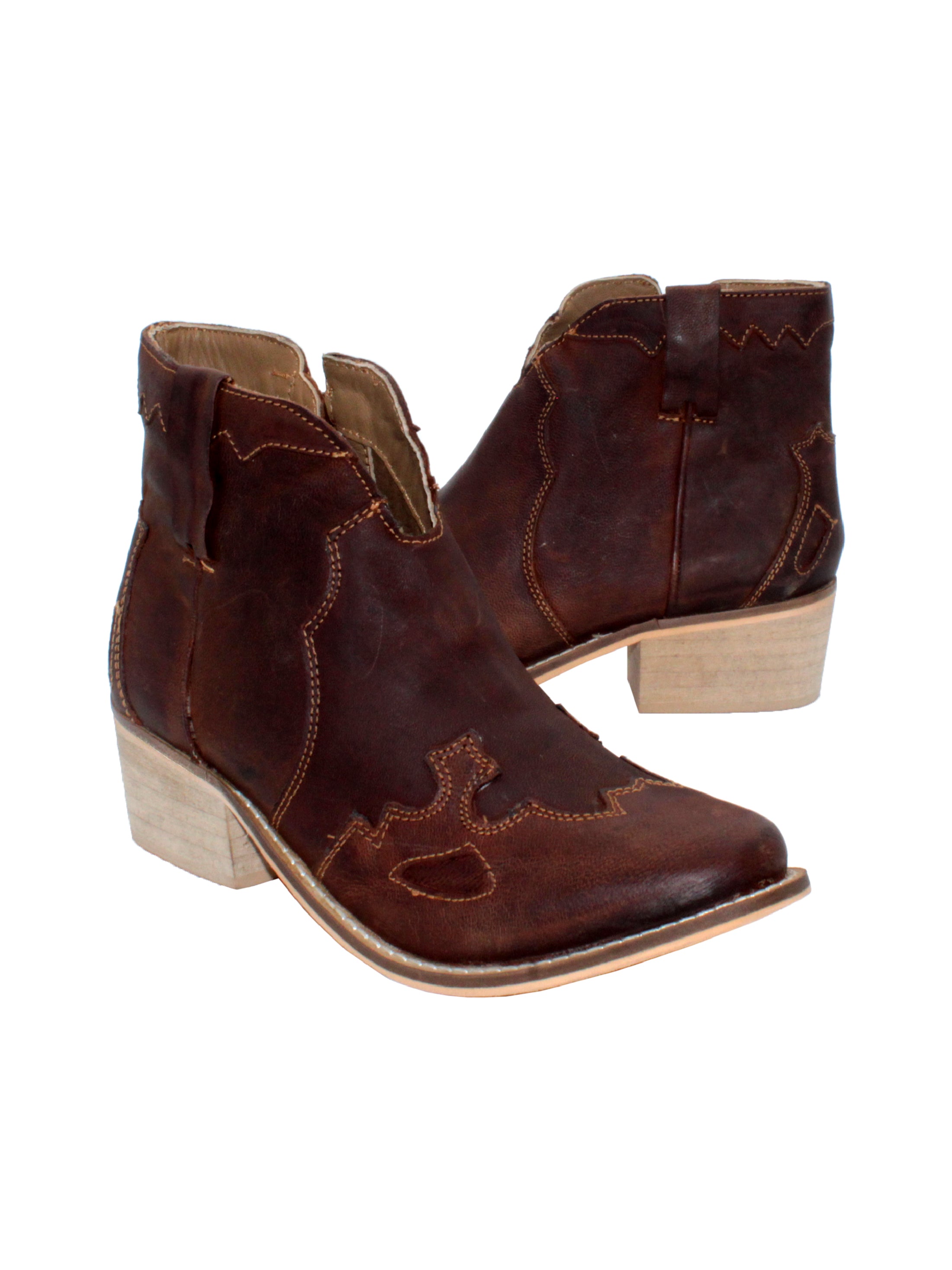 Very Volatile’s ‘Drexel’ bootie is a western inspired ankle boot made in rich burnished leather. Featuring a dipped front topline, western overlays, and genuine stack heel. The inside zipper and self pull loops allow for easy on and off. Pair these with your favorite jeans and chunky sweater for the ultimate fall look. 