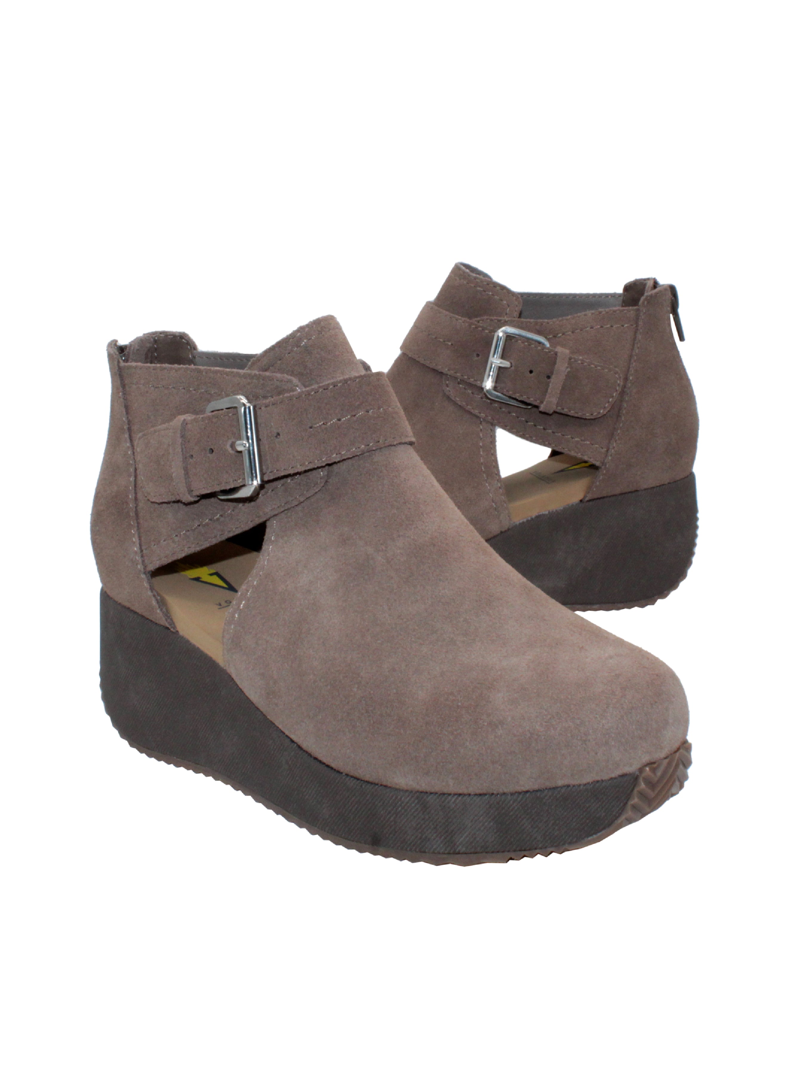 Volatile’s ultra-versatile ‘Flagstaff’ bootie gives you a lift with an easy to wear wedge that is balanced by a substantial platform, making it comfortable to walk in all day. It has a side cut out detail, large adjustable metal buckle, and back zipper so you can slip these on with ease. 